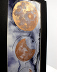 Blue-and-Bronze-Hanging-Moon-Phases-Painting
