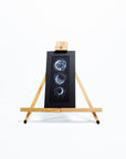 Black-and-White-Hanging-Moon-Phases-Painting-Easel